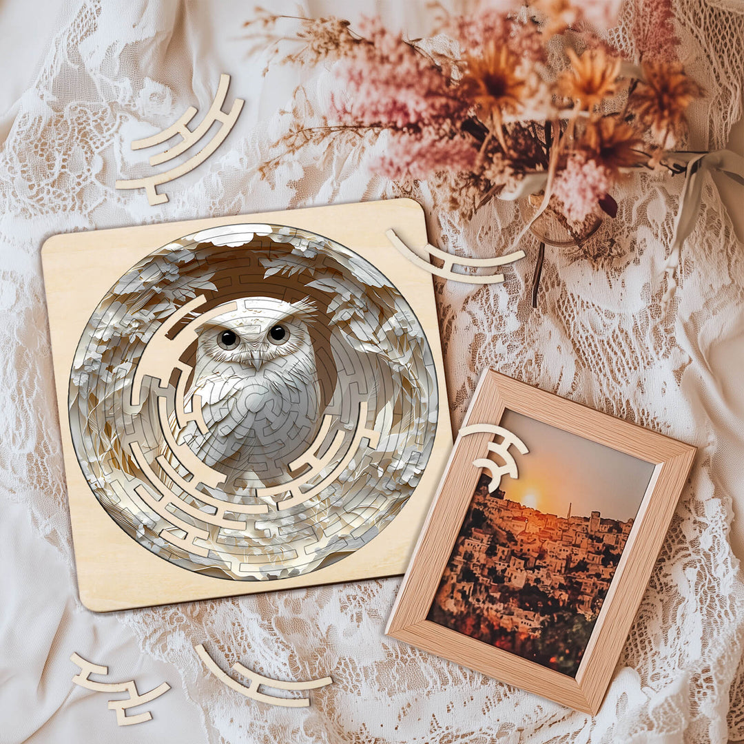 Maze Puzzles Elegant Owl on soft fabric, featuring wooden pieces and a framed photo in the background, ideal for mindful play.