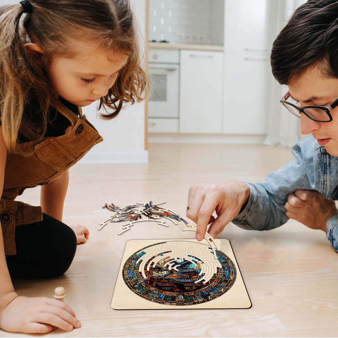 A child and an adult assembling the Maze Puzzles¡ªLibrary Dragon jigsaw puzzle on the floor, promoting focus and cognitive skills.
