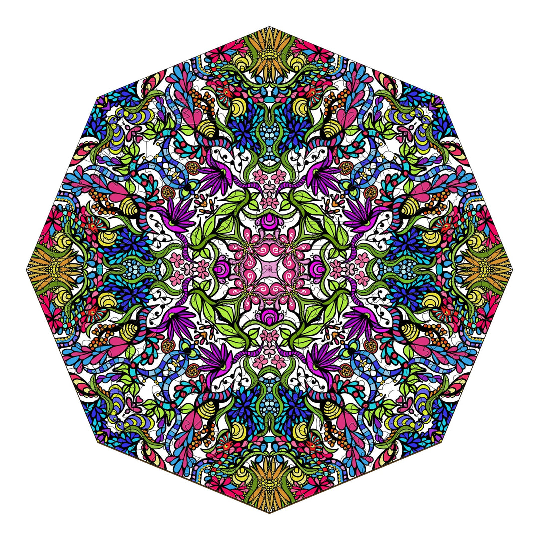 Colorful hexagonal mandala pattern featuring intricate floral and doodle designs by Lori Anne McKague.