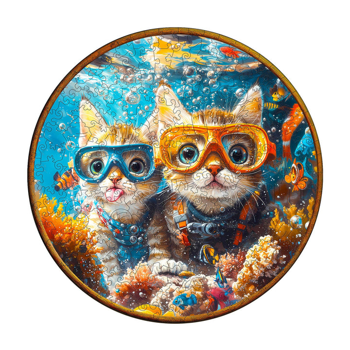 Diving cats wooden jigsaw puzzle featuring two kittens in scuba gear exploring an underwater scene.
