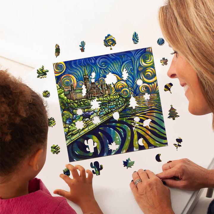 Mother and child assembling a colorful puzzle inspired by art, promoting creativity and bonding time.