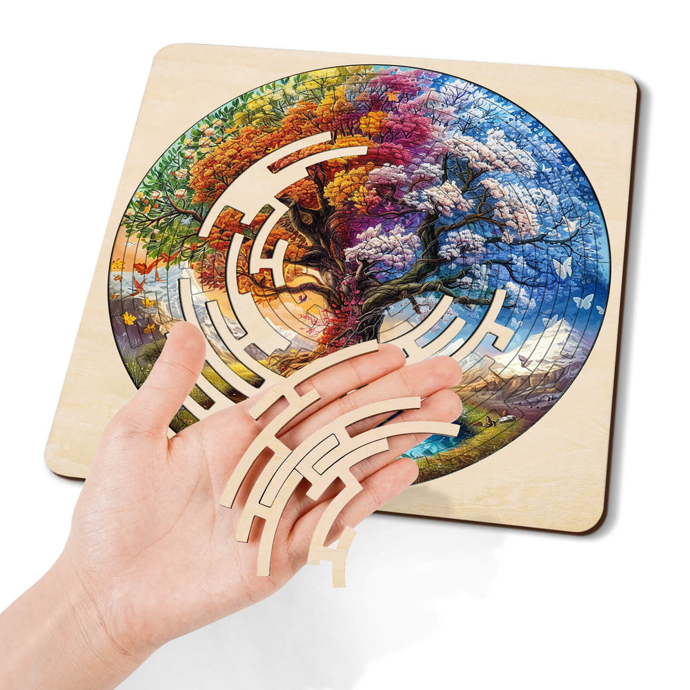 Colorful Tree of Life maze puzzle in hand, showcasing vibrant design and intricate pieces for brain training.