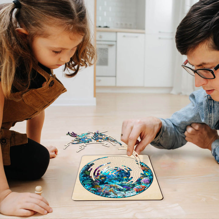 Adult and child enjoying the Maze Puzzles¡ªBlue Ocean, focusing on jigsaw puzzle exploration together.