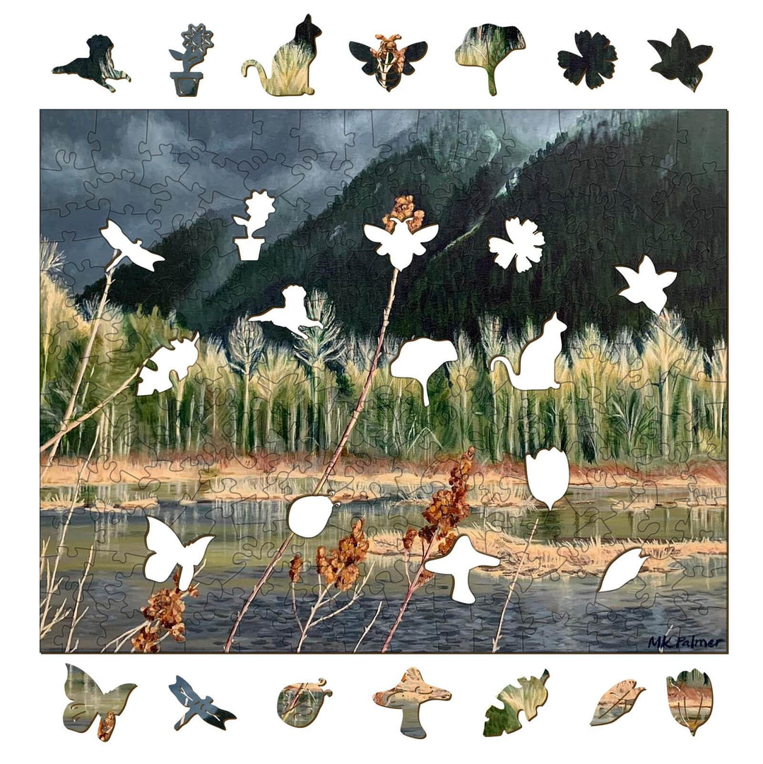 Distant Storm puzzle by artist Marianne K Palmer featuring artistic nature and whimsical cutout shapes.